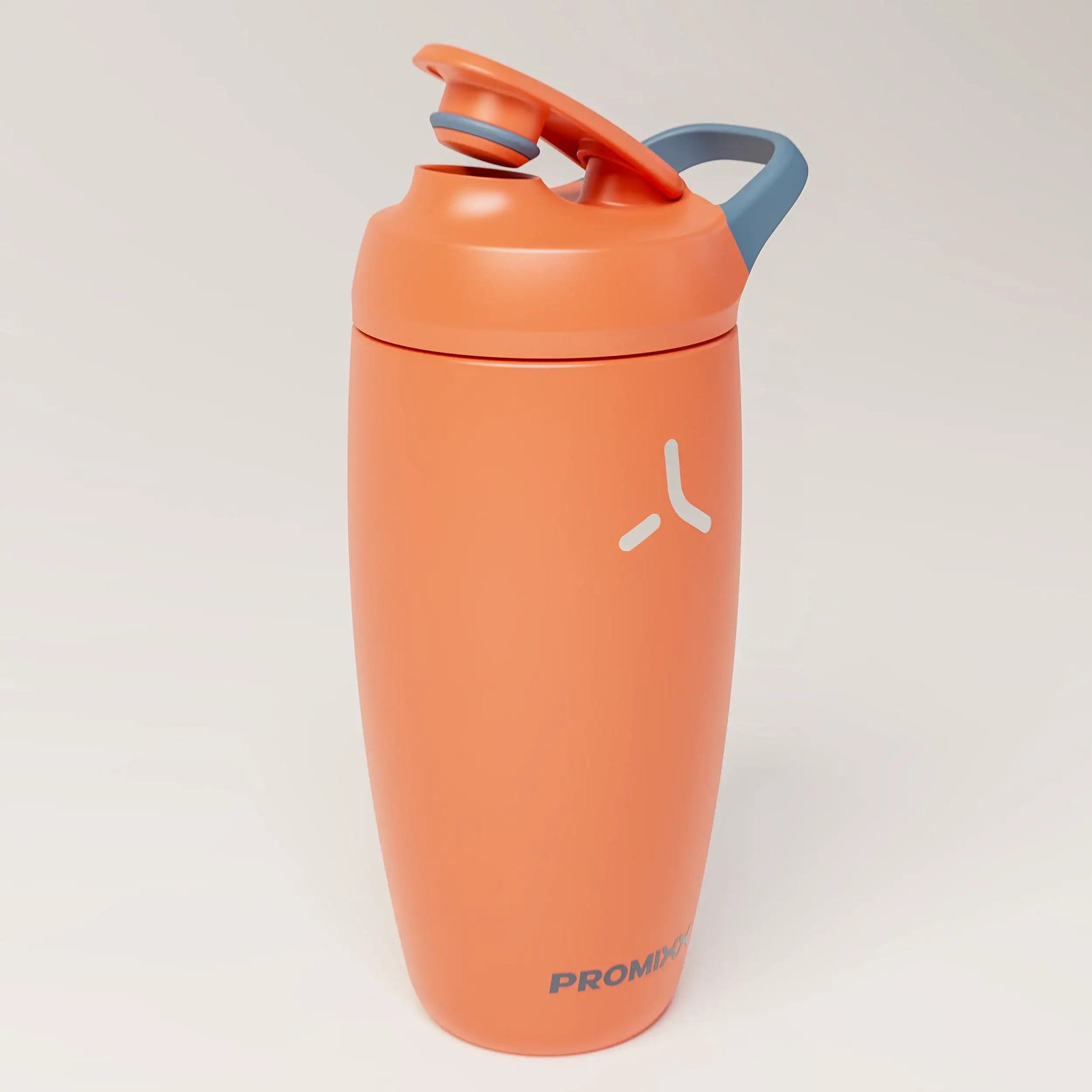 insulated-performance-shaker-bottle-c4 SHKR_18550_dwSS-S1.1_burntOrange_midnightBlue_2_3_highLeft_edit.png